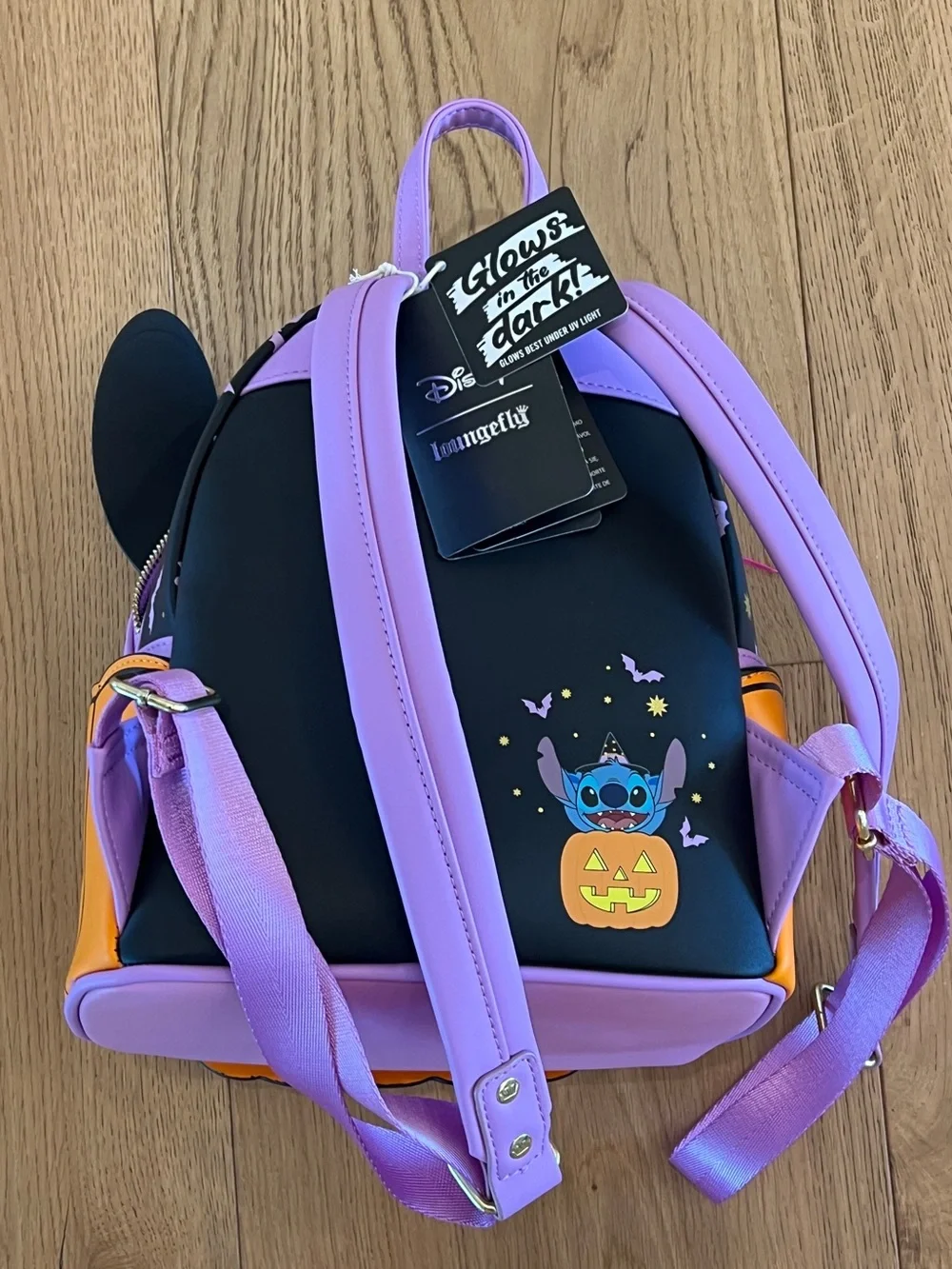 Disney x Loungefly Halloween Angle Pumpkin Mini Backpack. Glow in the dark.